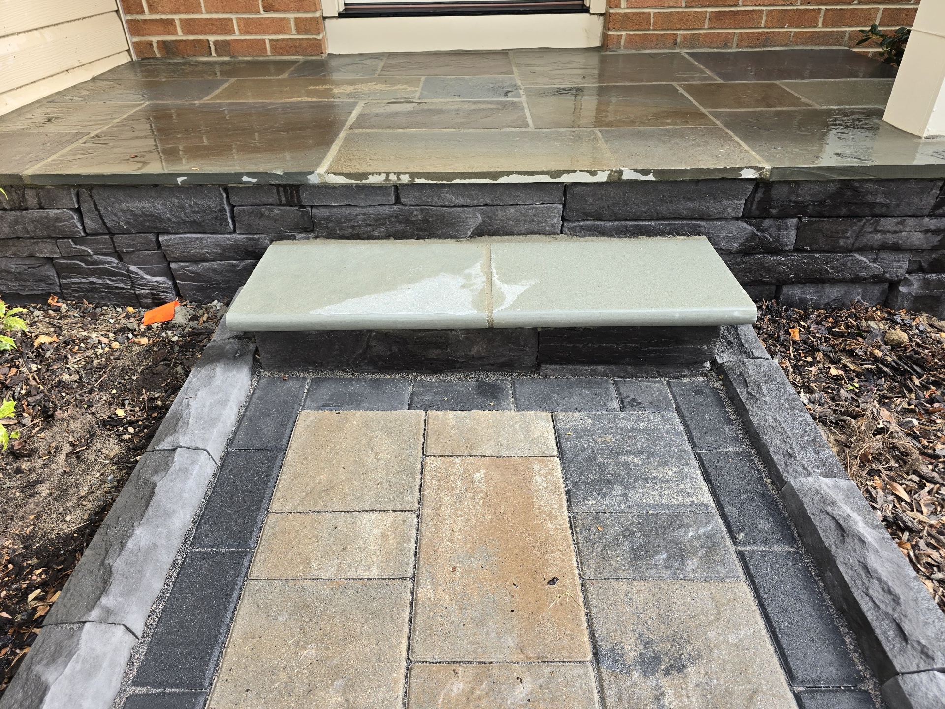 Bluestone front porch step with stacked stone risers
